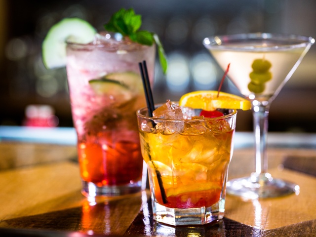 Colorful cocktails on the bar table in restaurant.